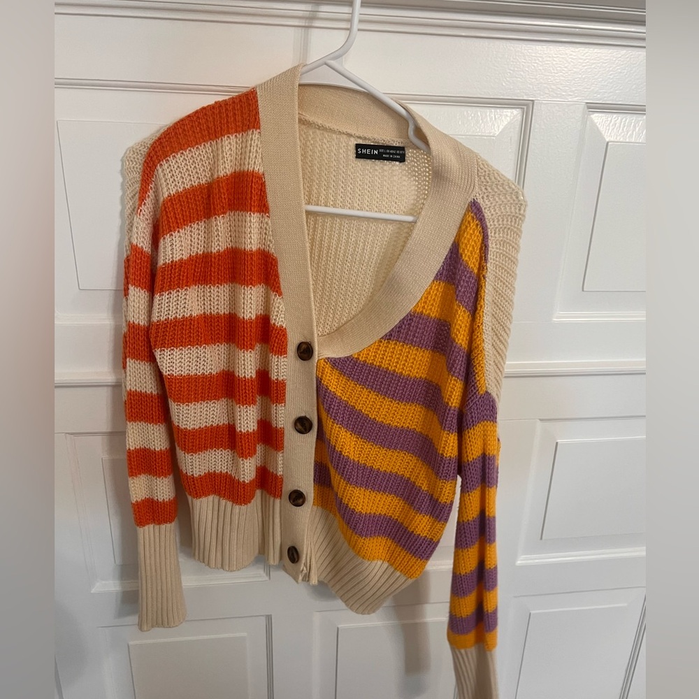 Multi colored striped cardigan sweater.